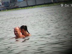 Hidden beach camera video of attractive nudist men and women