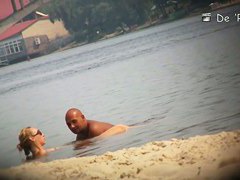 Hidden beach camera video of attractive nudist men and women