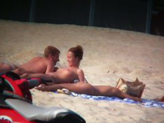 Sexy blonde and naughty brunette on nude beach