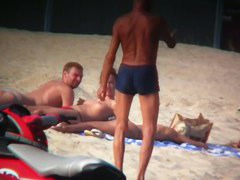 Sexy blonde and naughty brunette on nude beach