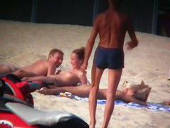 Sexy blonde and naughty brunette on nude beach