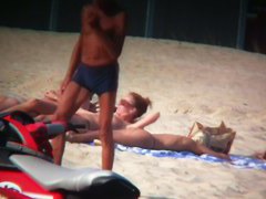 Sexy blonde and naughty brunette on nude beach