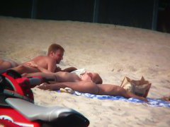 Sexy blonde and naughty brunette on nude beach