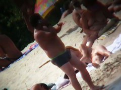 Naked mature babe captured by voyeur nudist beach