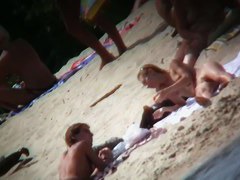 Naked mature babe captured by voyeur nudist beach