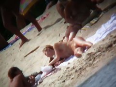 Naked mature babe captured by voyeur nudist beach