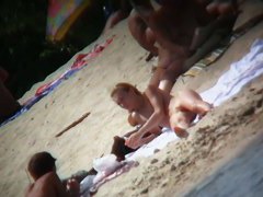 Naked mature babe captured by voyeur nudist beach