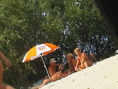 The group of real nudists playing cards on my voyeur camera