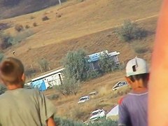 Sexy beach nudist girl spied talking on phone near water