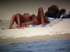 Hot wife flaunts her bushy muff on a nudist beach