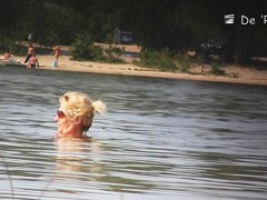 Teen girls in panties get their tits on beach voyeur video