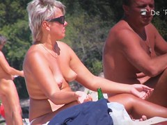 Teen girls in panties get their tits on beach voyeur video