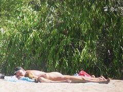 Beach nudist hunter voyeuring nude bodies from behind bushes