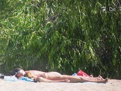 Beach nudist hunter voyeuring nude bodies from behind bushes