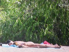 Beach nudist hunter voyeuring nude bodies from behind bushes