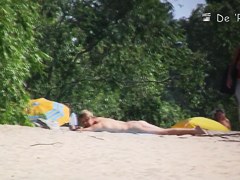 Beach nudist hunter voyeuring nude bodies from behind bushes