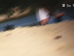 Beach voyeur movie with nude amateur lying on her belly