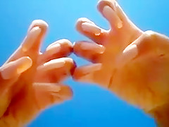 Long nails and sand on the beach