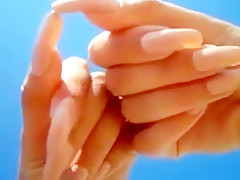 Long nails and sand on the beach