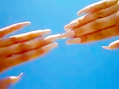 Long nails and sand on the beach