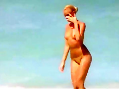 Topless beach girls  lots of them