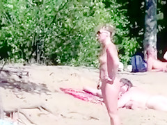 Nude beach - pointy little tits babe - embarrassed