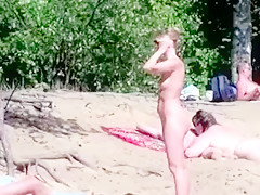 Nude beach - pointy little tits babe - embarrassed