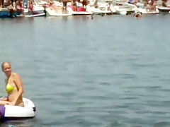 Spring break for college coeds outside and flashing for beads