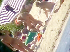 The family that sunbathes in the nude together, stays toget