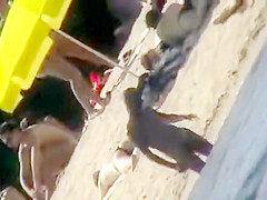 The family that sunbathes in the nude together, stays toget