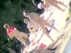 The family that sunbathes in the nude together, stays toget