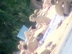 The family that sunbathes in the nude together, stays toget