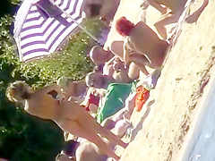 The family that sunbathes in the nude together, stays toget