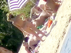 The family that sunbathes in the nude together, stays toget