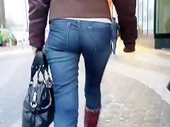 Ass in blue jeans go to the office