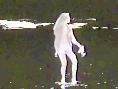 Brunette flashes at public park  beach