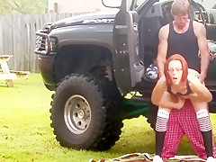Amateur redhead in 4x4 gets fuck in public
