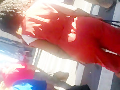 Older Lady With A Phatty In Orange Outfit.mp4