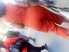 Older Lady With A Phatty In Orange Outfit.mp4