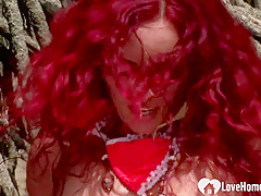 Redhead chick sucking cock and riding on beach