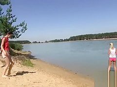 Two hot lesbians bang at the beach