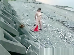 Giant road cone fuck at a public beach