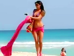 Hot college girl in thong bikini at the beach