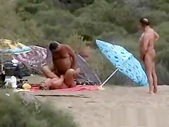 Amateur swingers on the beach