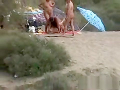 Amateur swingers on the beach