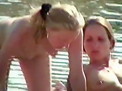 Girls Topless at the Beach III