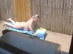 Kim Bates caught laying out in the nude. Enjoy the view.