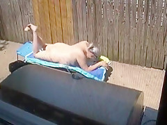 Kim Bates caught laying out in the nude. Enjoy the view.