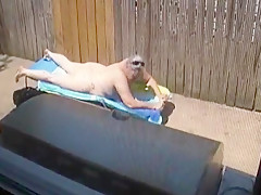 Kim Bates caught laying out in the nude. Enjoy the view.