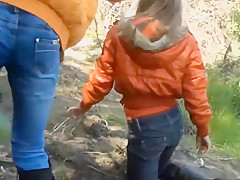 Three Girls in Mud in Winter Clothes